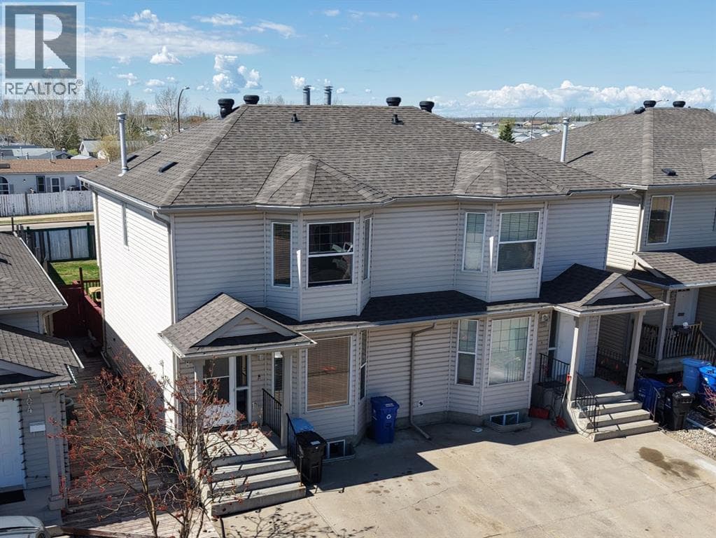 108 Kodiak Crescent — photo 2