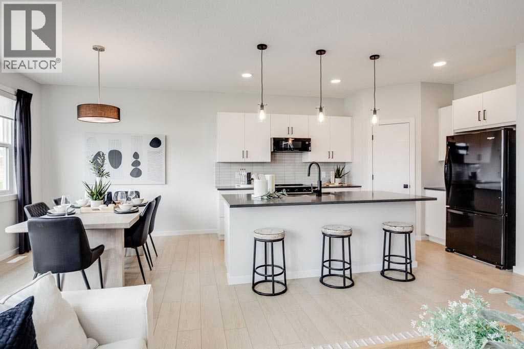 3 bed 3 bath single family at 102 Rochester Crescent NW — $814,900 — photo 6