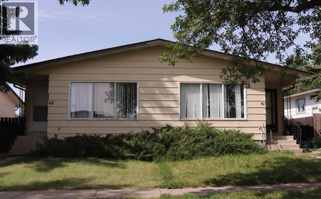 48 and 50 Jerry Potts Boulevard W