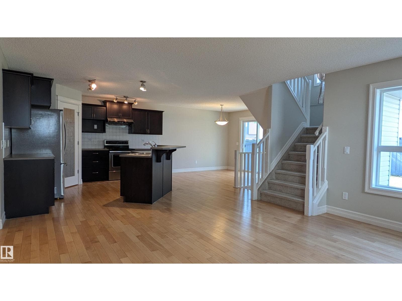 5 bed 4 bath single family at 11312 13 AVE SW SW — $610,000 — photo 6