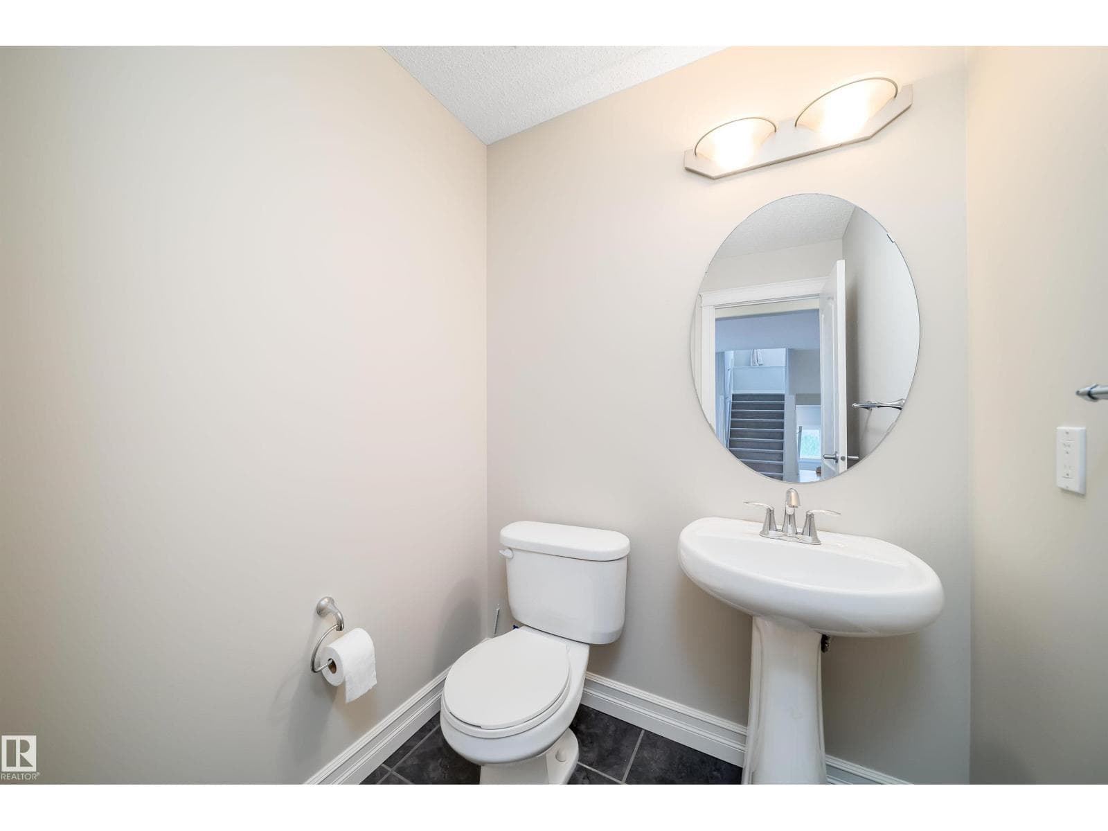 5 bed 4 bath single family at 11312 13 AVE SW SW — $610,000 — photo 8