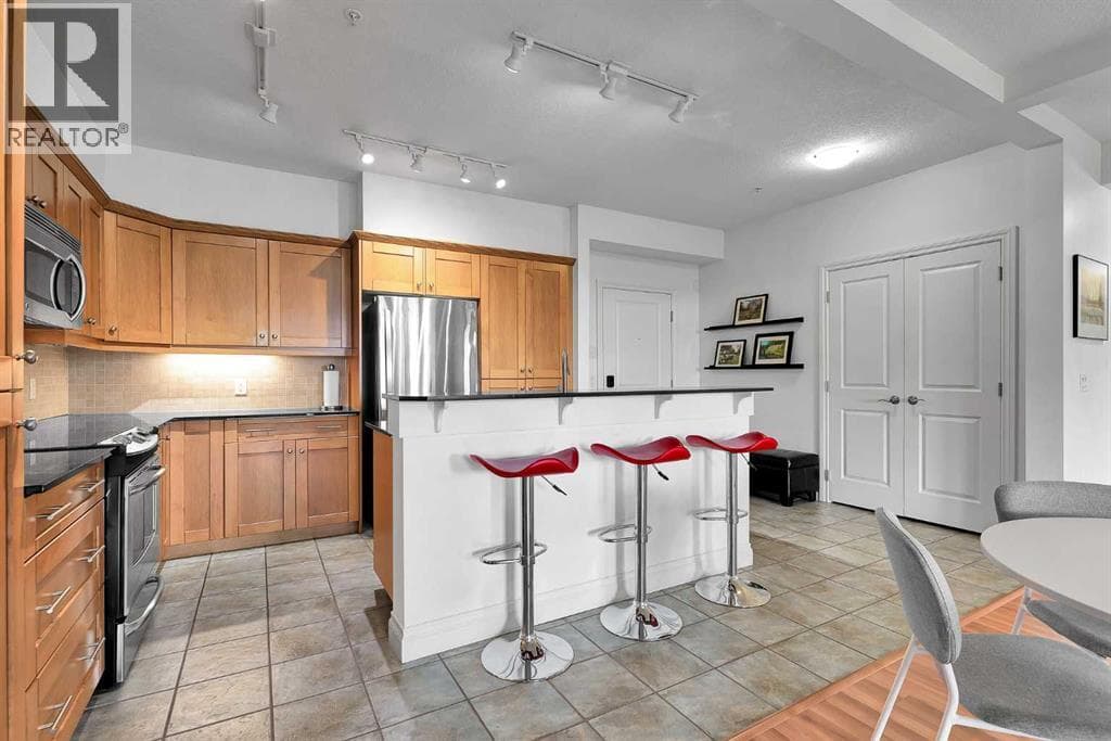 2105, 10221 Tuscany Boulevard NW — photo 5