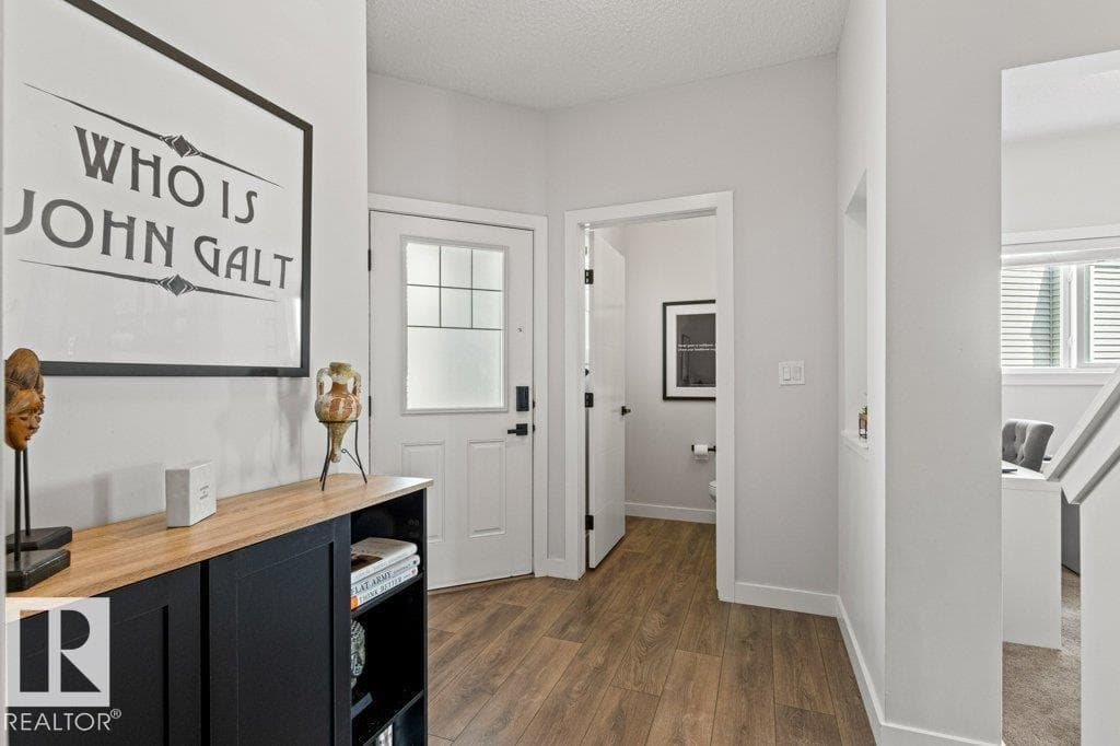 8023 EVANS CR NW — photo 3