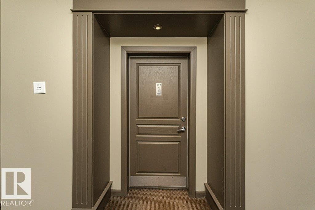 #302 160 MAGRATH RD NW — photo 5