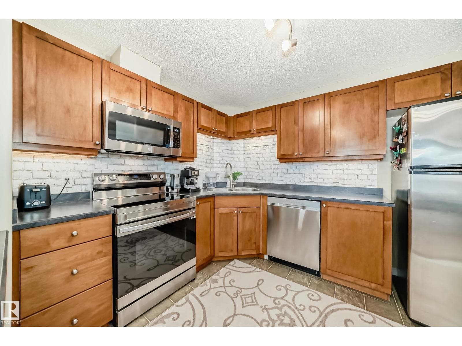 #1309 7339 SOUTH TERWILLEGAR DR NW — photo 2
