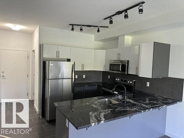 #402 10611 117 ST NW
