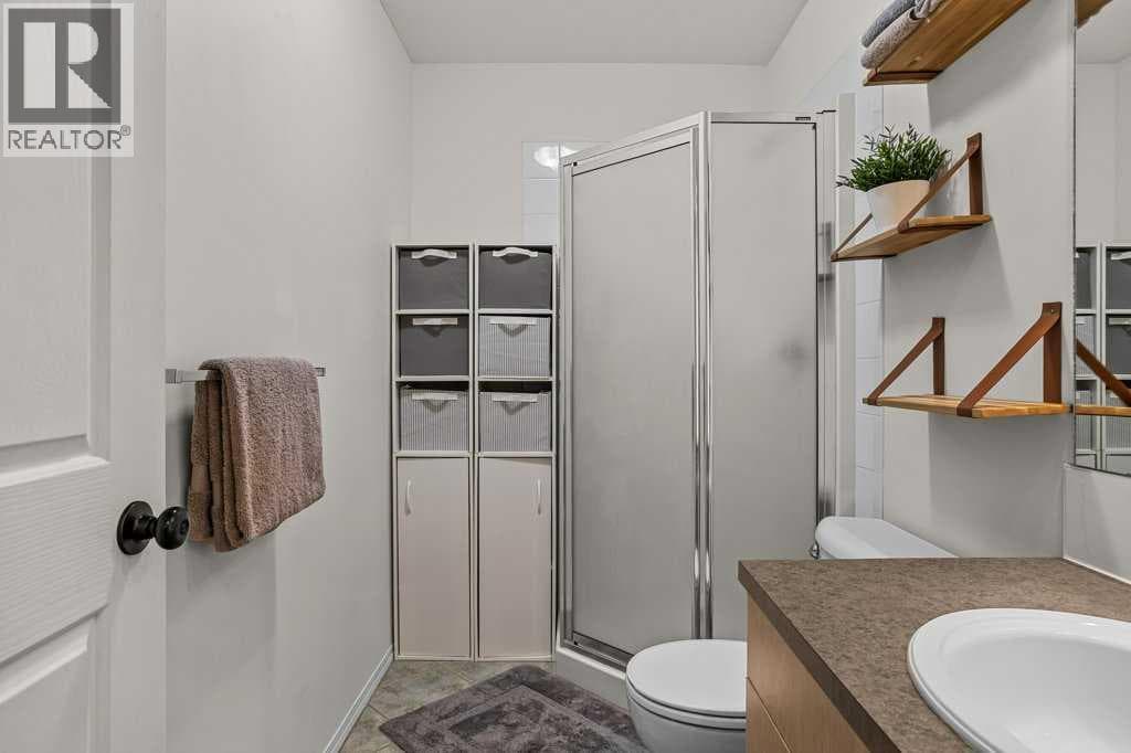 204, 512 Bow Valley Trail — photo 4