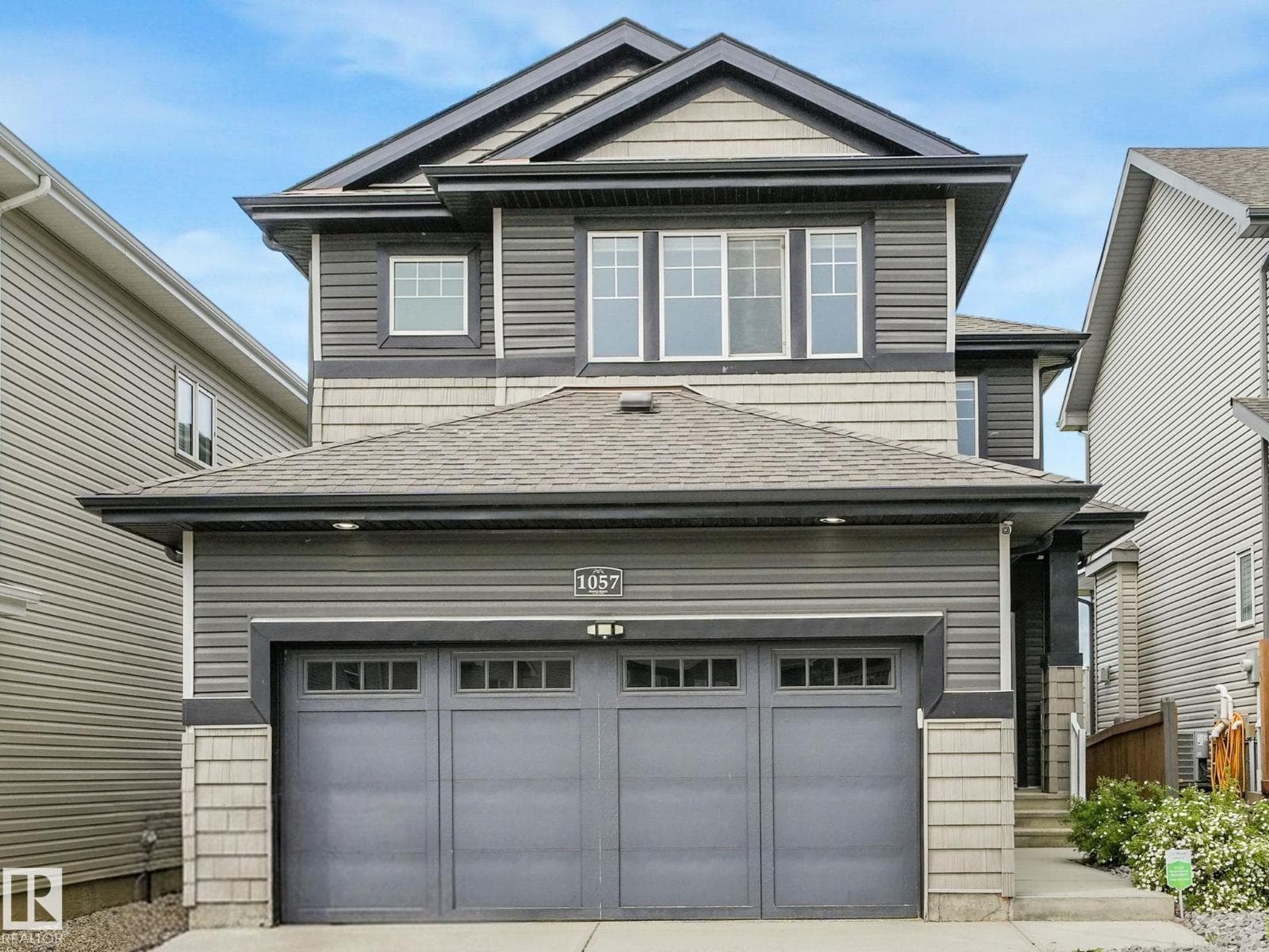 1057 COOPERS HAWK LI NW
