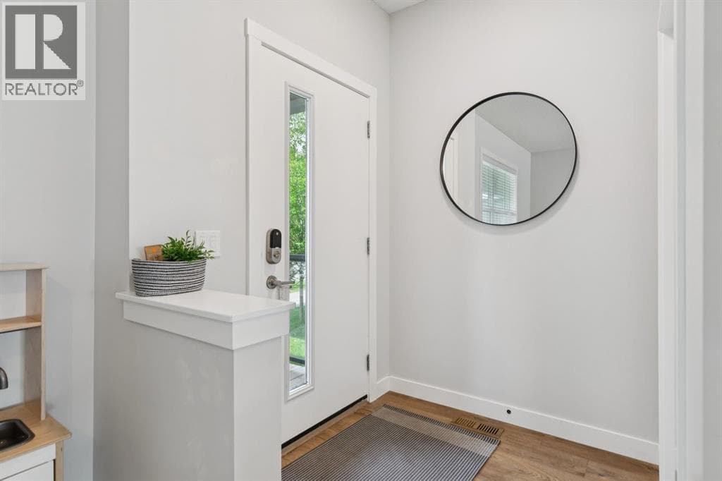 124 Wolf Willow Boulevard SE — photo 3