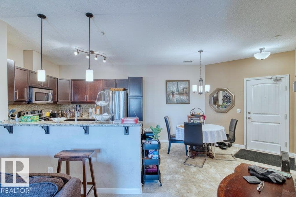 #319 6083 MAYNARD WY NW — photo 5