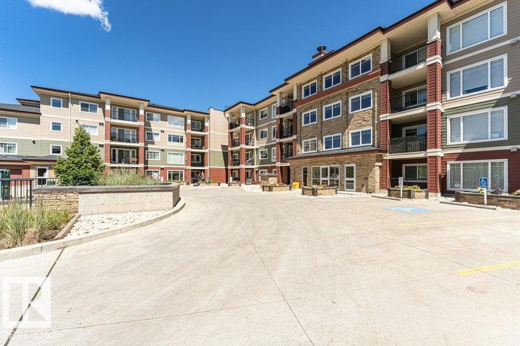 #207 7021 SOUTH TERWILLEGAR DR NW — photo 5