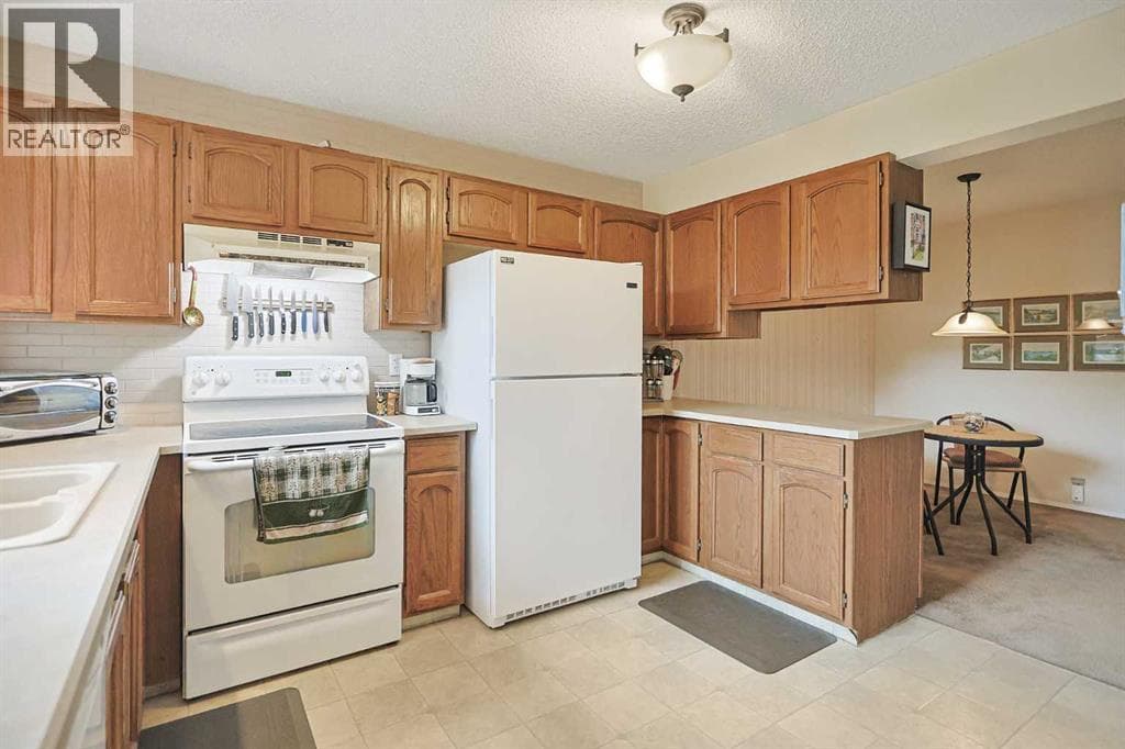 121, 1190 Ranchview Road NW — photo 3