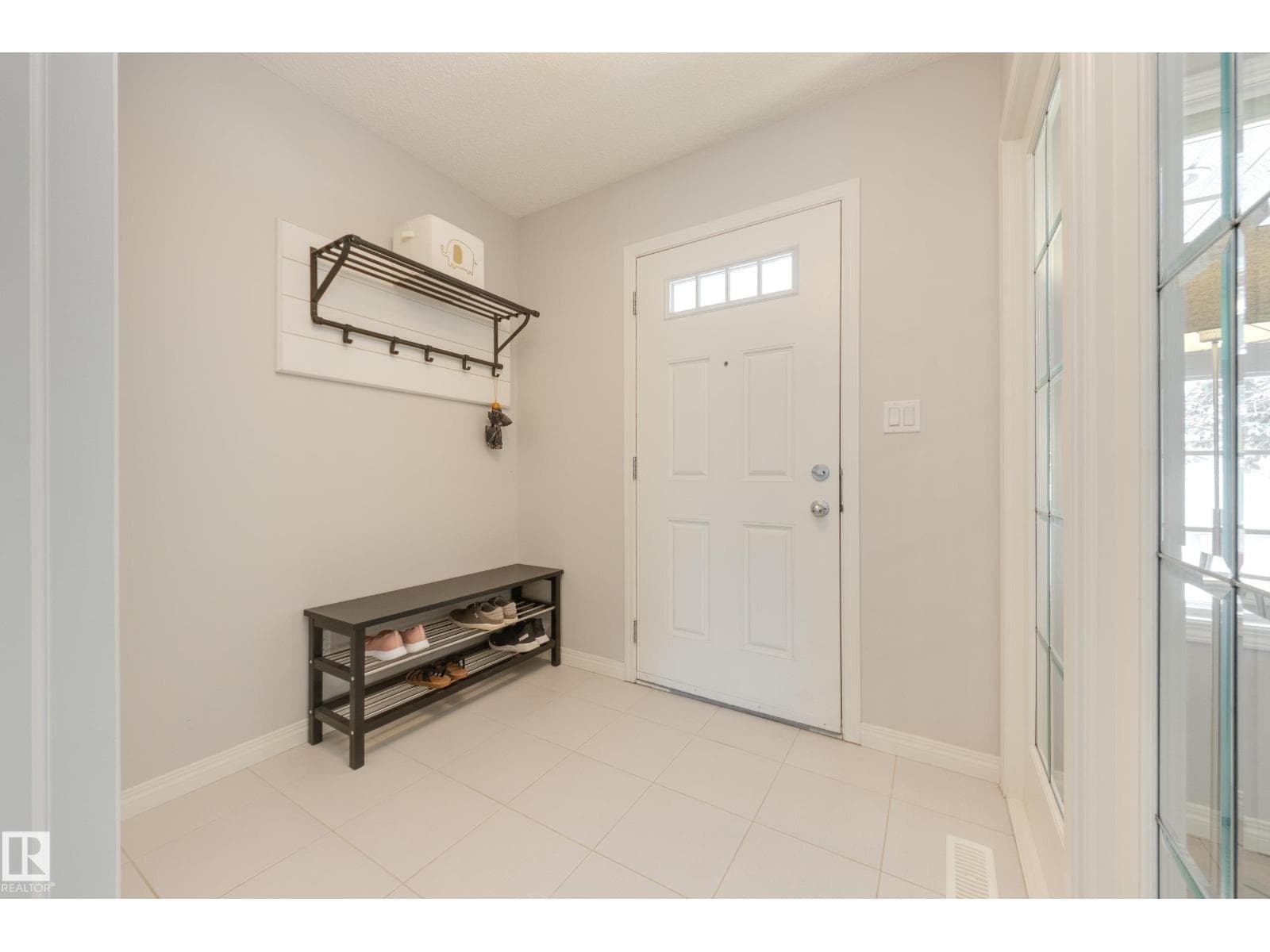 7987 ERASMUS CR NW — photo 3