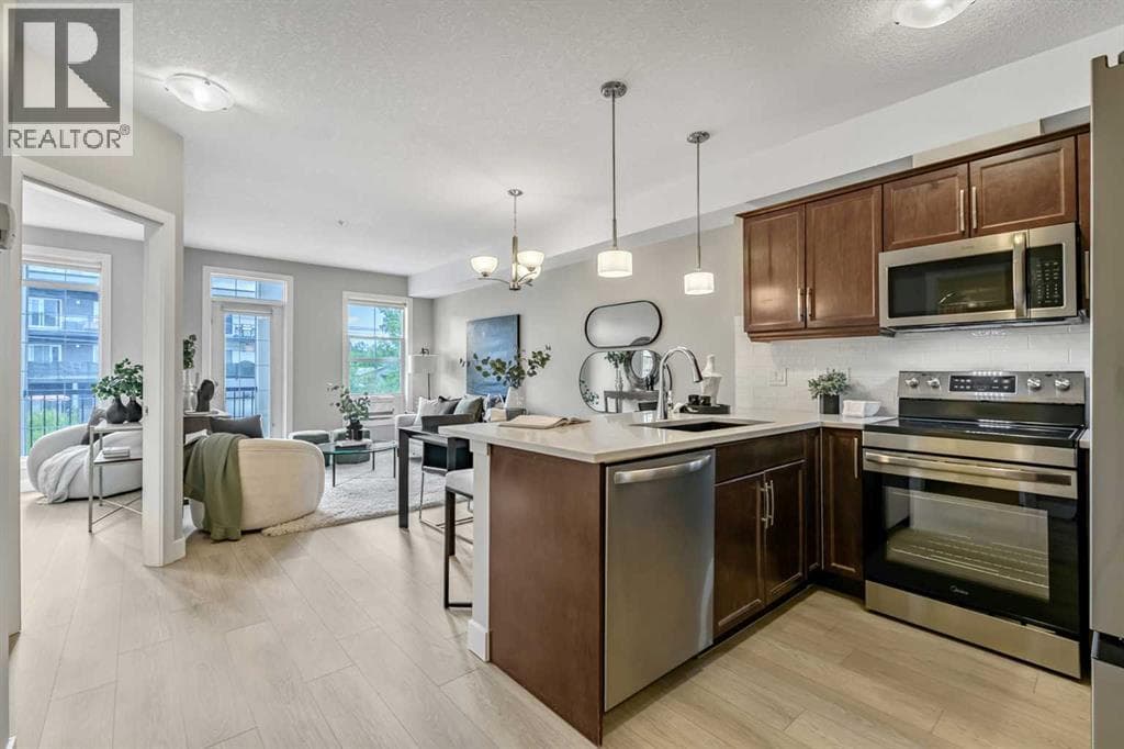 211, 15304 Bannister Road SE — photo 3
