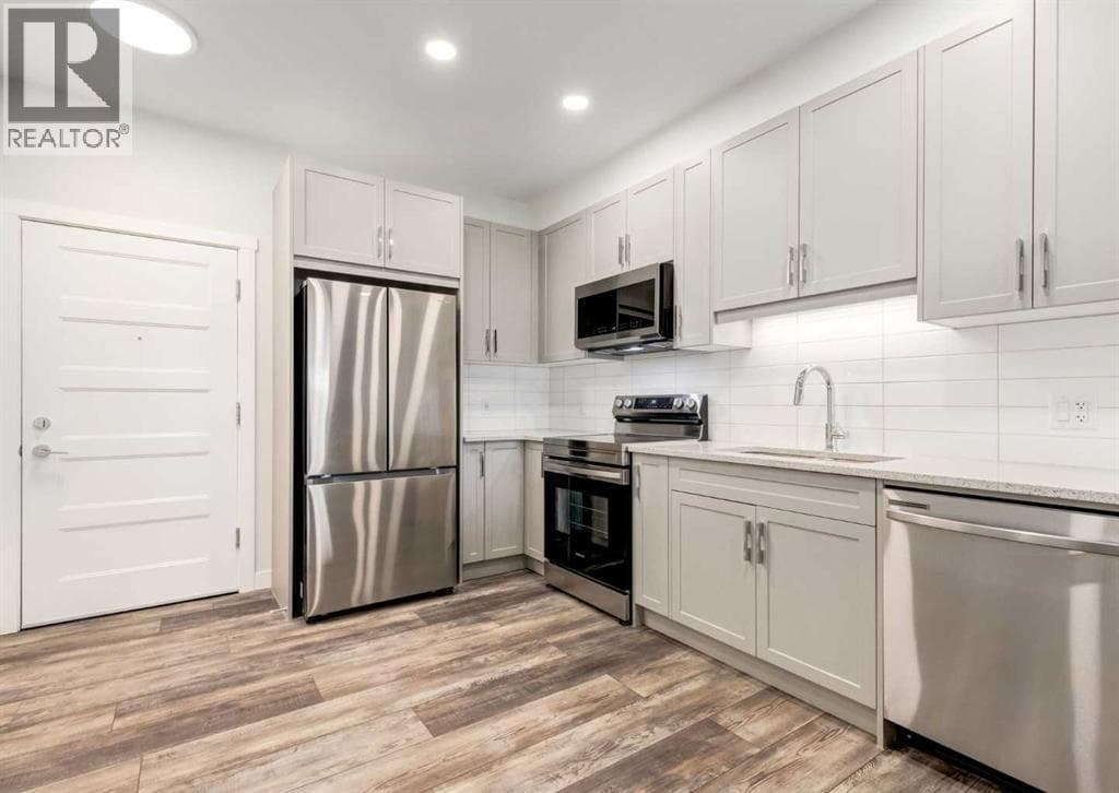 408, 125 Wolf Hollow Crescent SE — photo 4