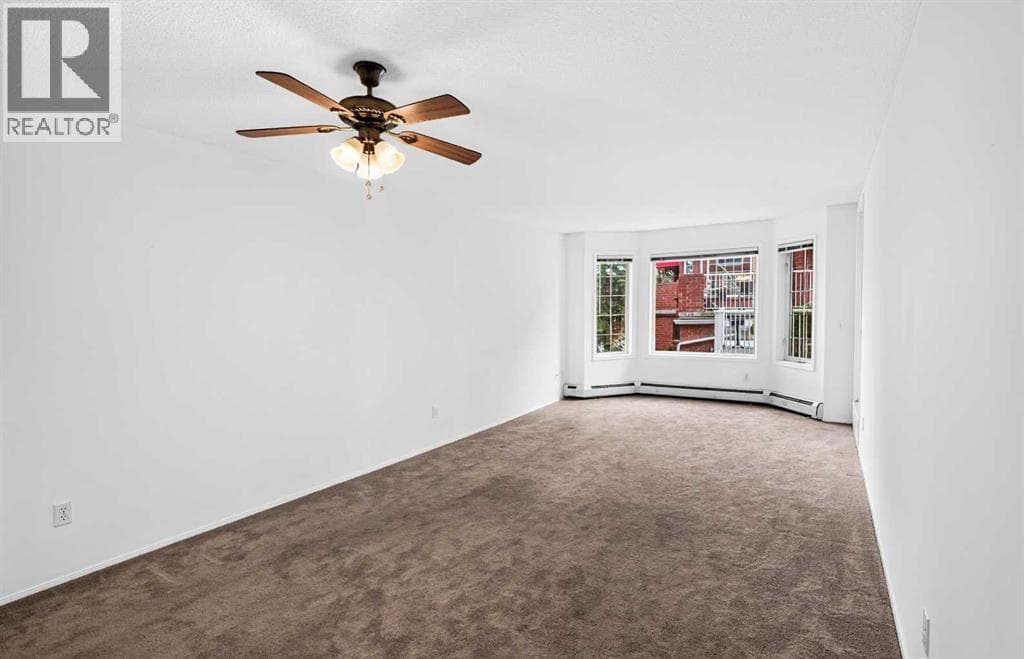 3205, 3000 Sienna Park Green SW — photo 2