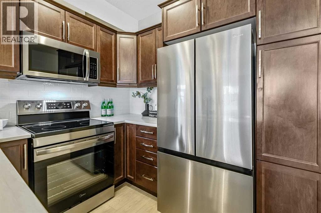 211, 15304 Bannister Road SE — photo 5