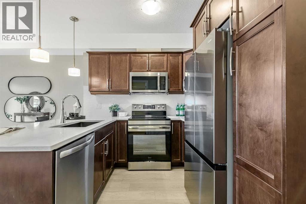 211, 15304 Bannister Road SE — photo 4