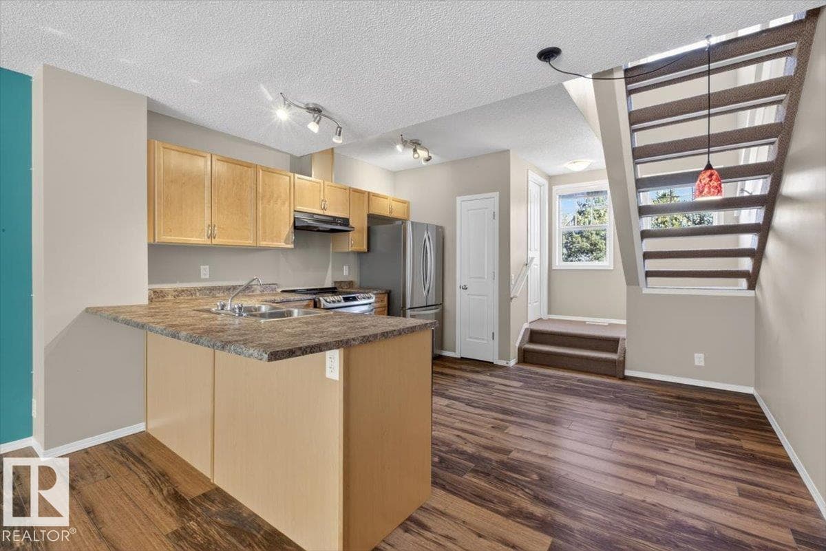 #130 5604 199 ST NW