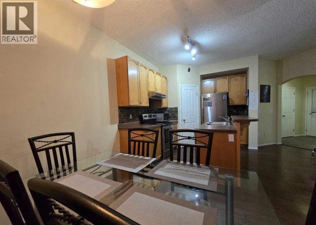 13 Tuscany Ridge Mews NW — photo 5