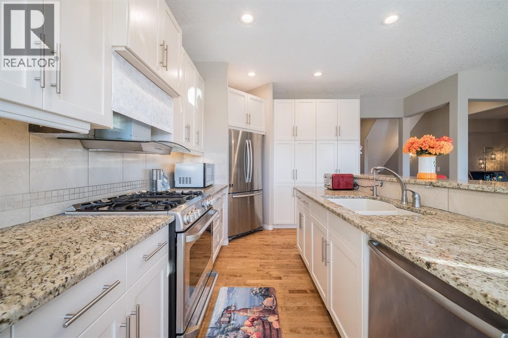 7 Aspen Stone Grove SW — photo 2