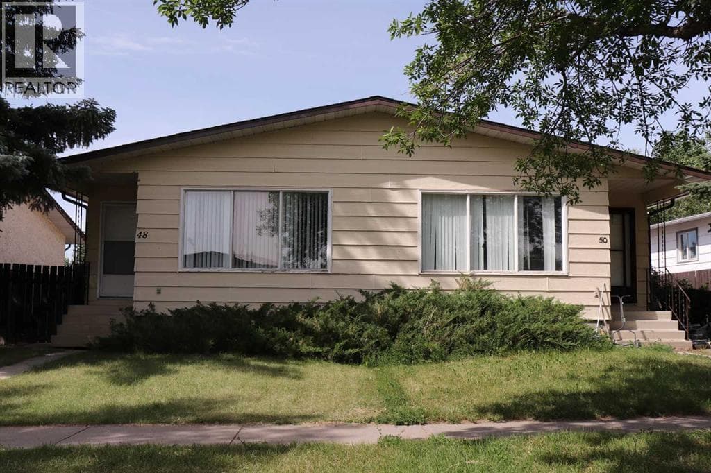 48 and 50 Jerry Potts Boulevard W