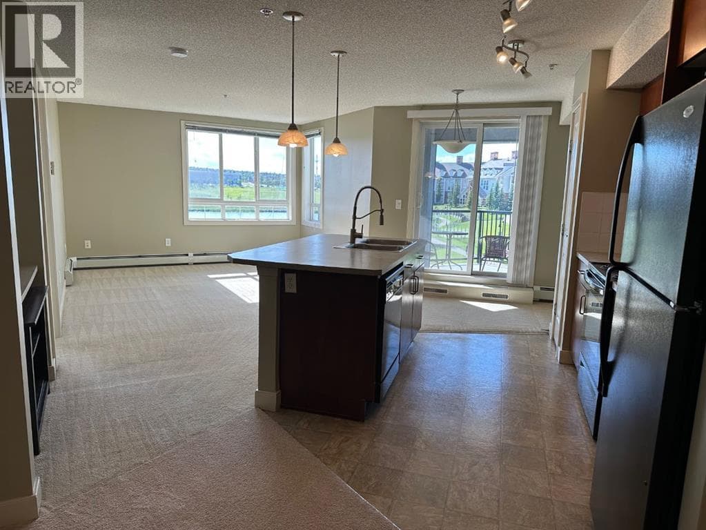 307, 108 Country village Circle NE — photo 2
