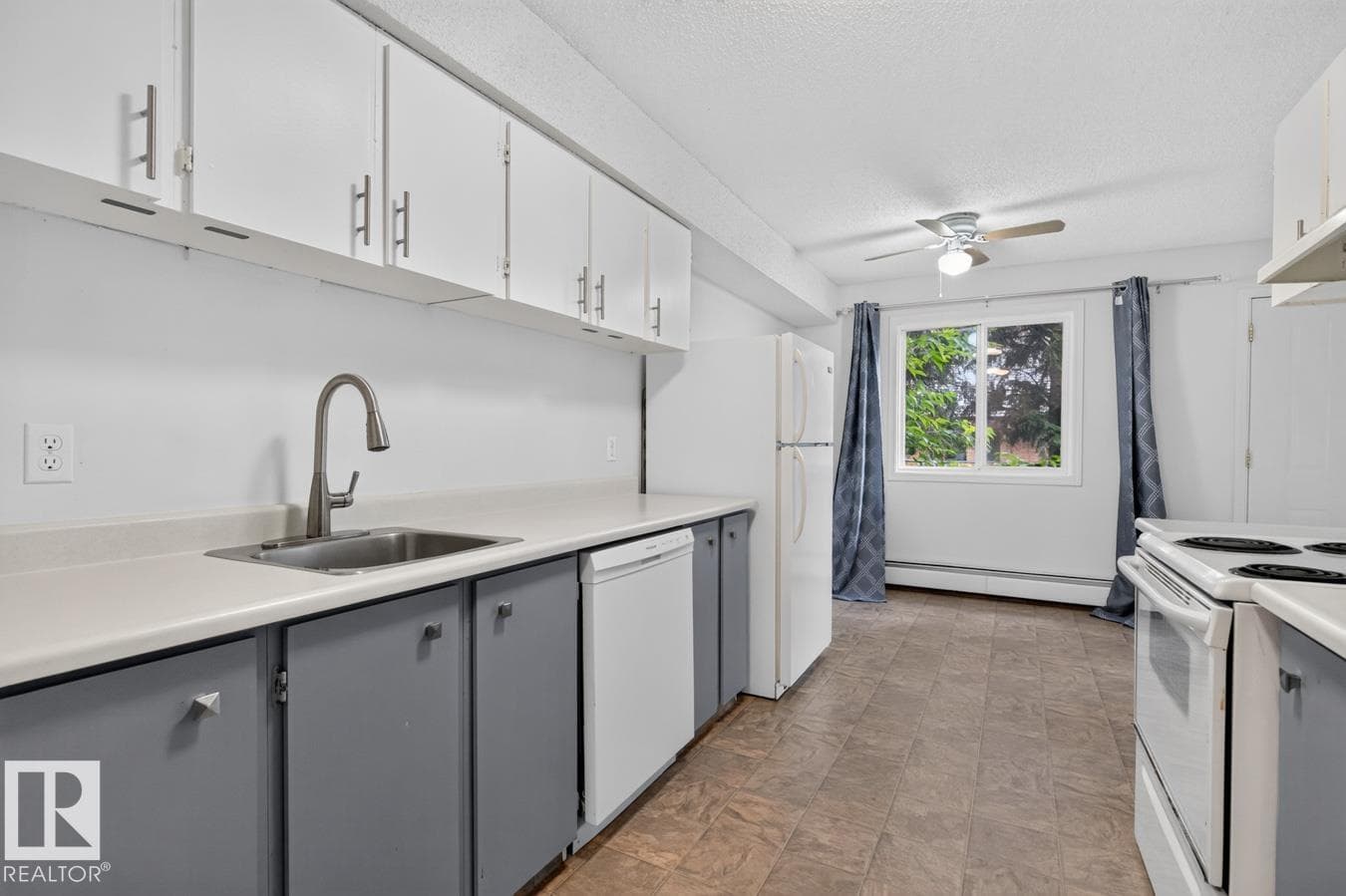 #106 237 WOODVALE RD W NW — photo 4
