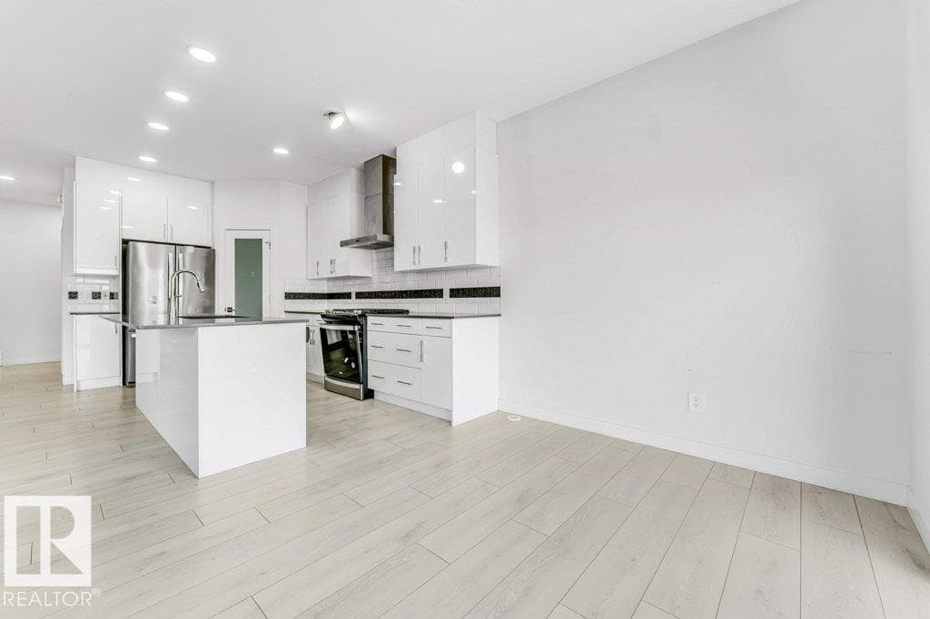 5140 23 AV SW — photo 5