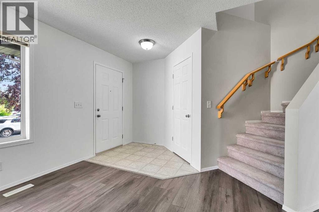 203 Covemeadow Crescent — photo 4