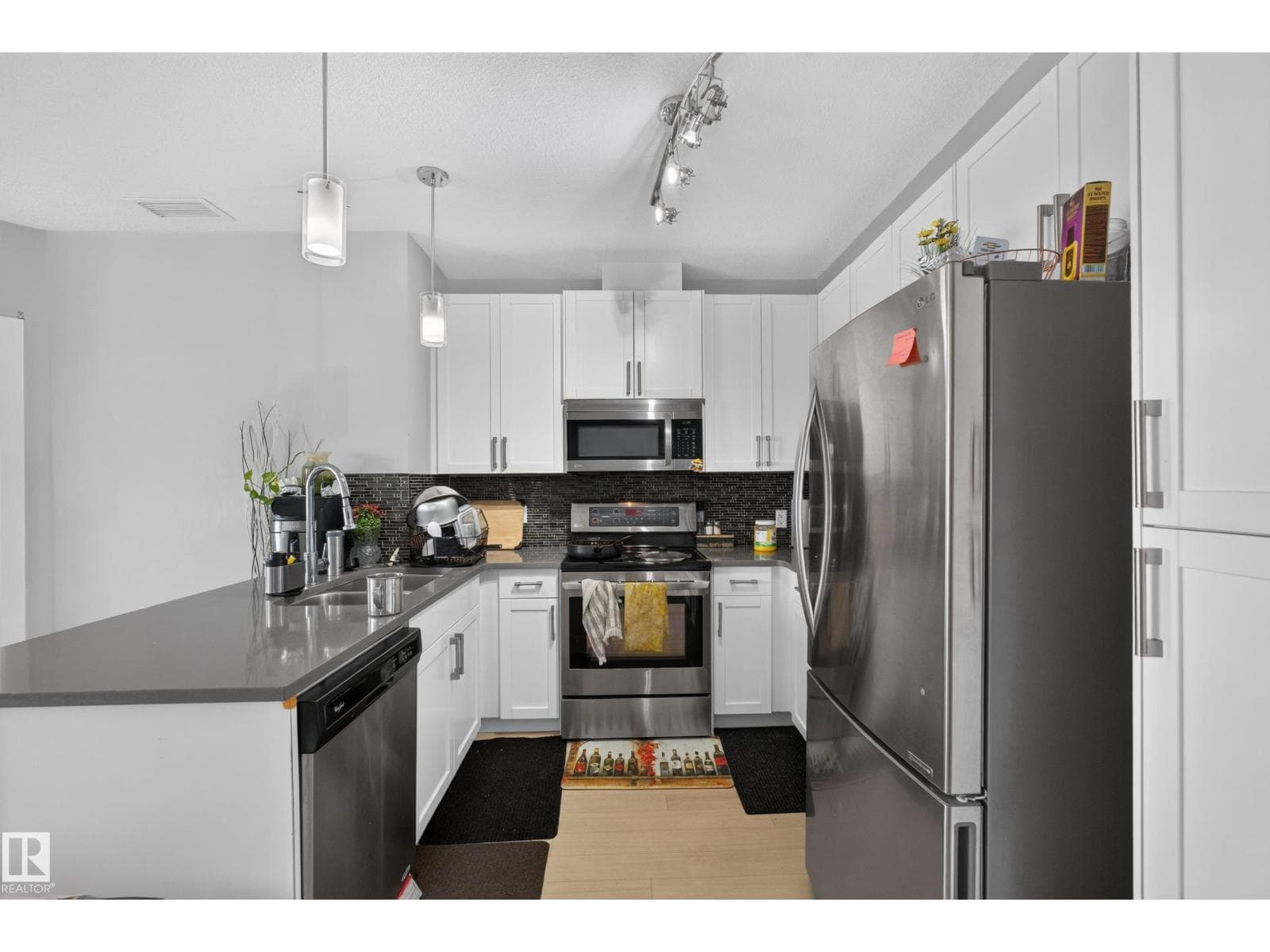 #706 5151 WINDERMERE BV SW — photo 4