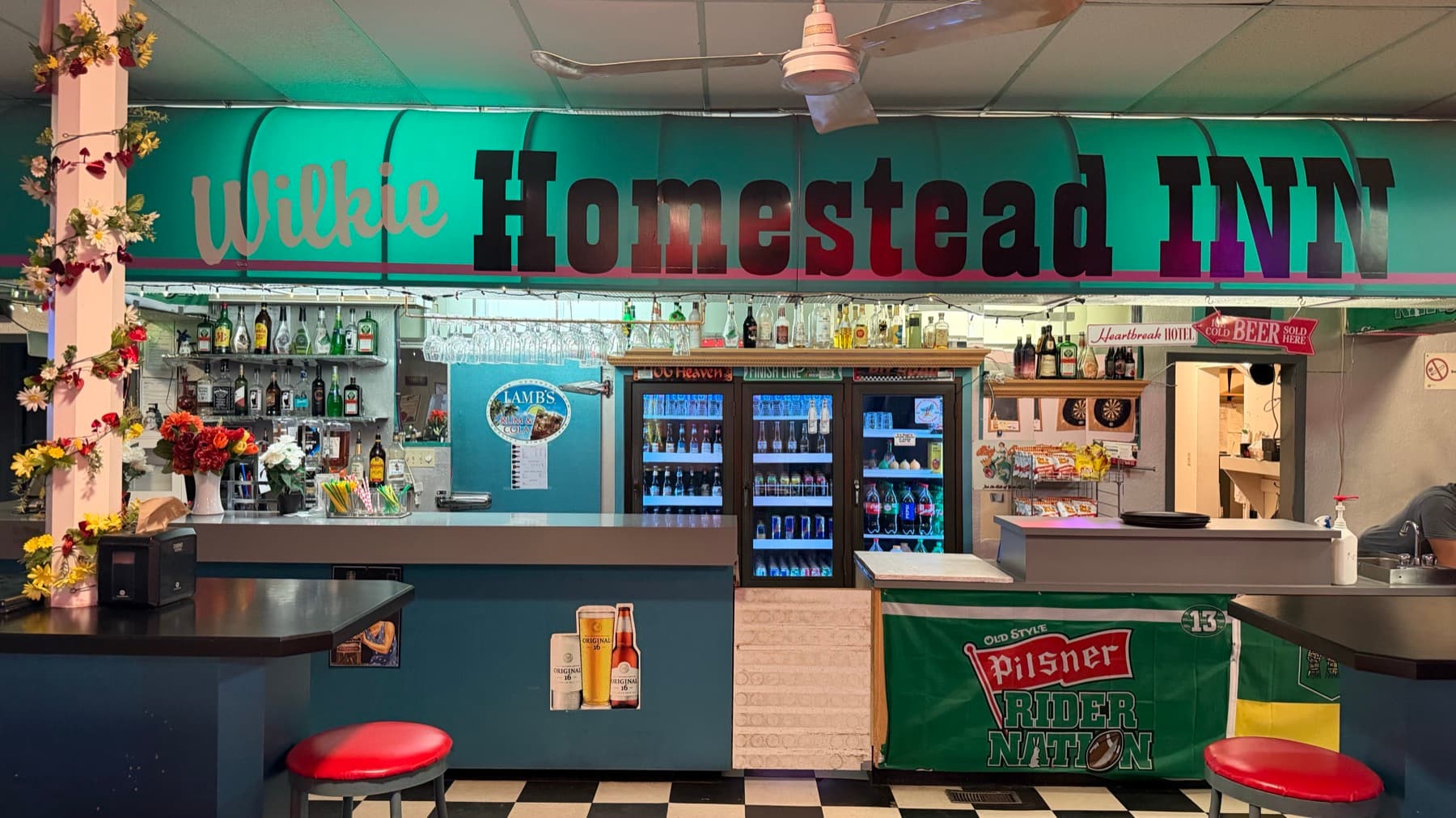 Homestead Inn bar sign and back bar