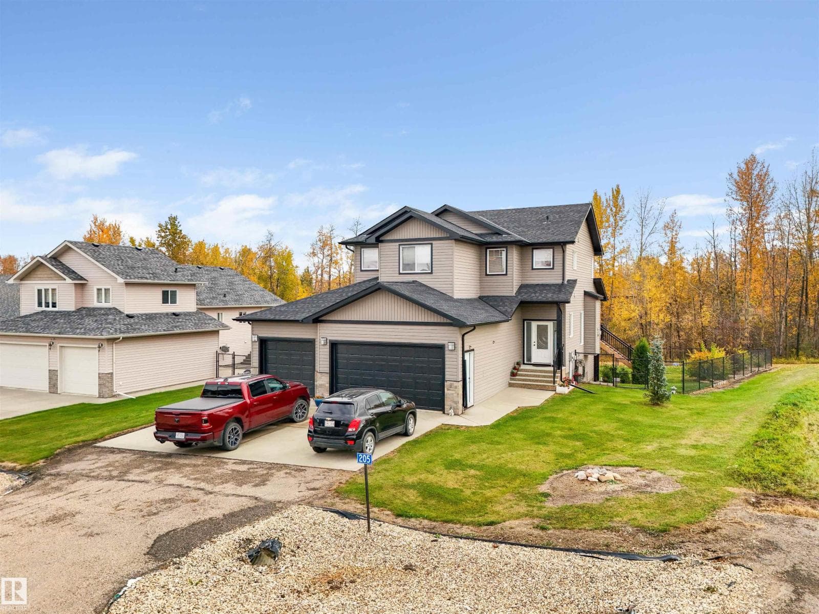 5 bed 4 bath single family at 205 49119 RR73 — $666,600