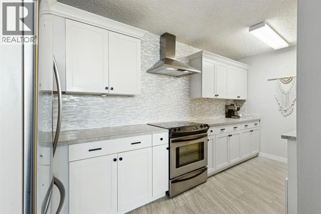 302, 314 14 Street NW photo 3