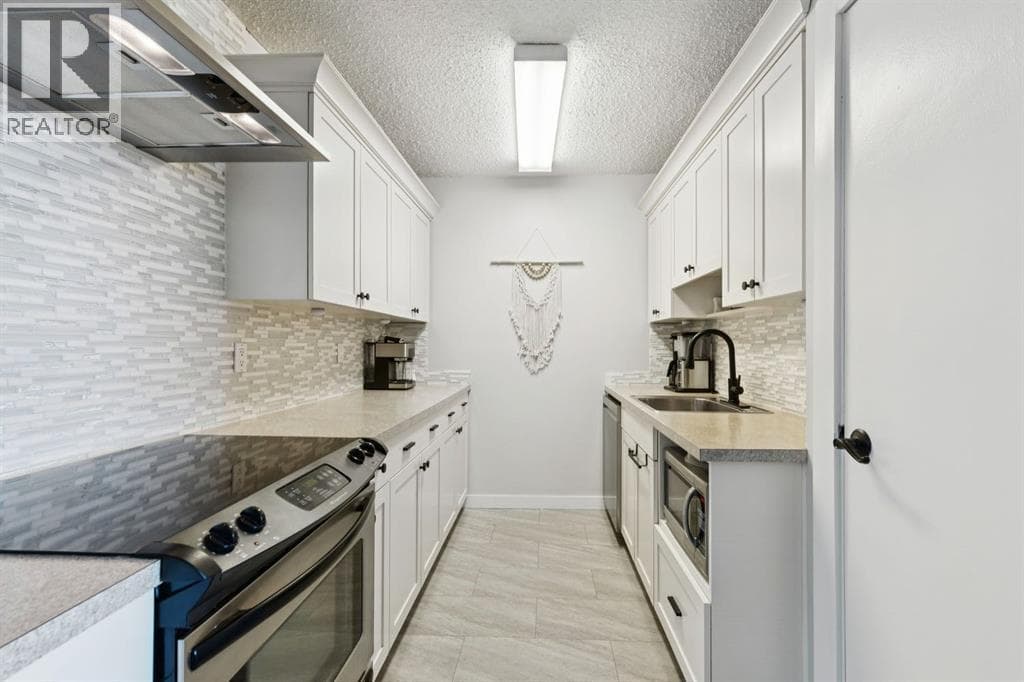 302, 314 14 Street NW photo 4
