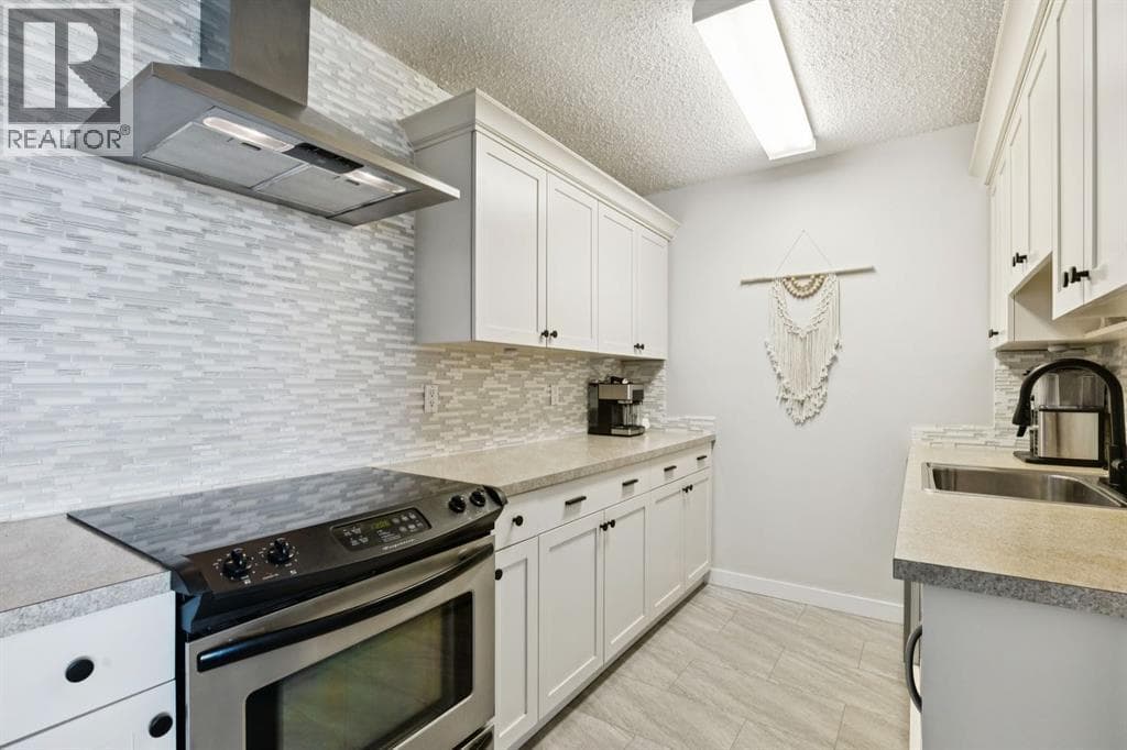 302, 314 14 Street NW photo 5