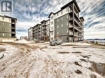 110, 30 Sage Hill Walk NW photo 3
