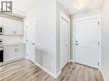 110, 30 Sage Hill Walk NW photo 5