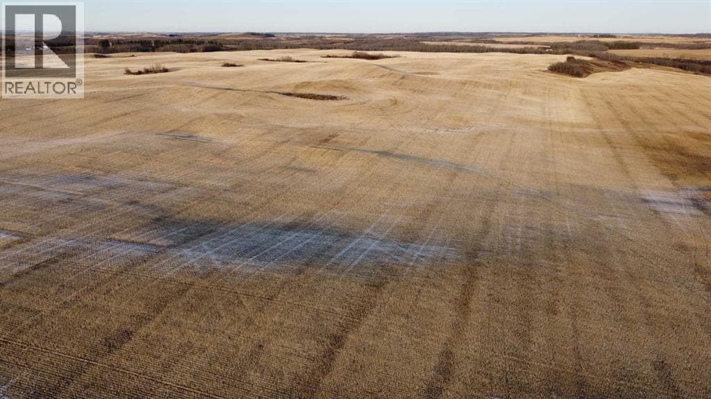 vacant land at NE 23-53-13-W4 & SE 23-53-13-W4 — $1,450,000