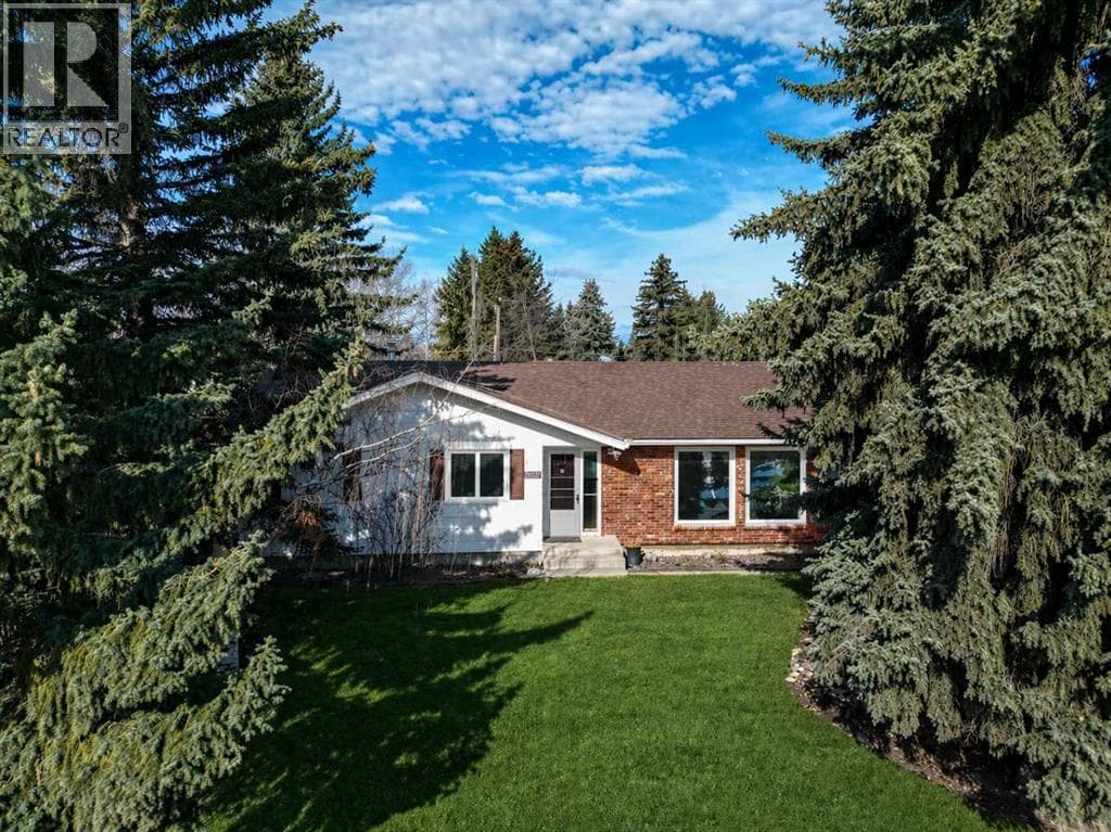 4 bed 3 bath single family at 5306 57 Avenue — $569,000